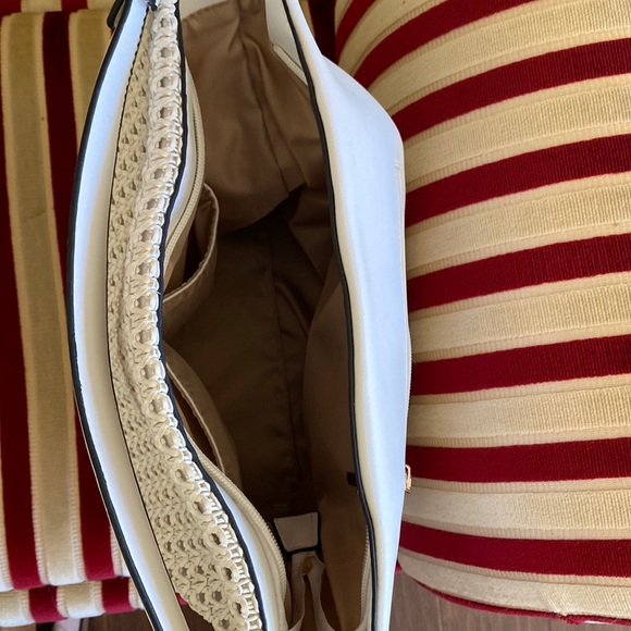 Olsen Bag.  Beautiful detail in front and amazing bag.  Lots of storage inside. - Picture 6 of 7